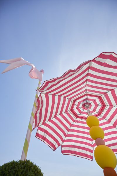 Striped Umbrella at a Dr Seuss themed baby shower, physically distant and socially connected, planned by In Any Event NY